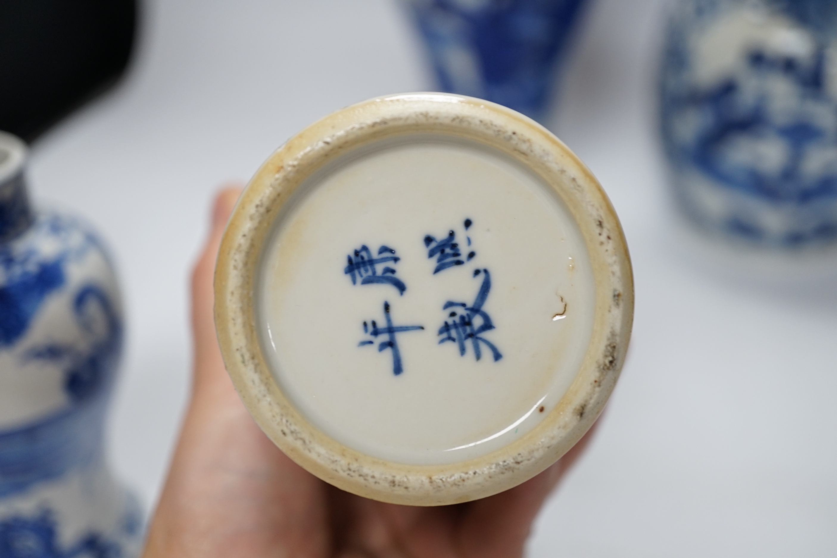 Five 19th century Chinese various sized blue and white figural vases, tallest double gourd vase 27cm high